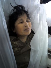 Slika tijela gđe Xu koja je potajno poslana iz Kine. Gđa. Xu je umrla nekoliko sati nakon što ju je otela policija u maju 2012. godine
